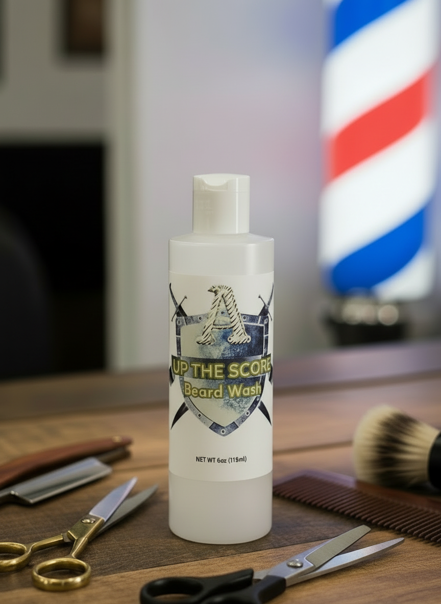 Beard care product set with bottle, brush, comb, and scissors on a white background