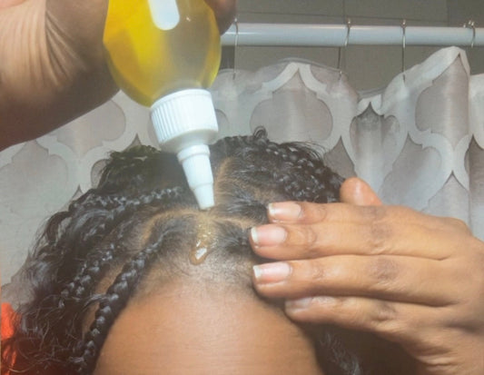Healthy scalp and textured natural hair with a clean hair part